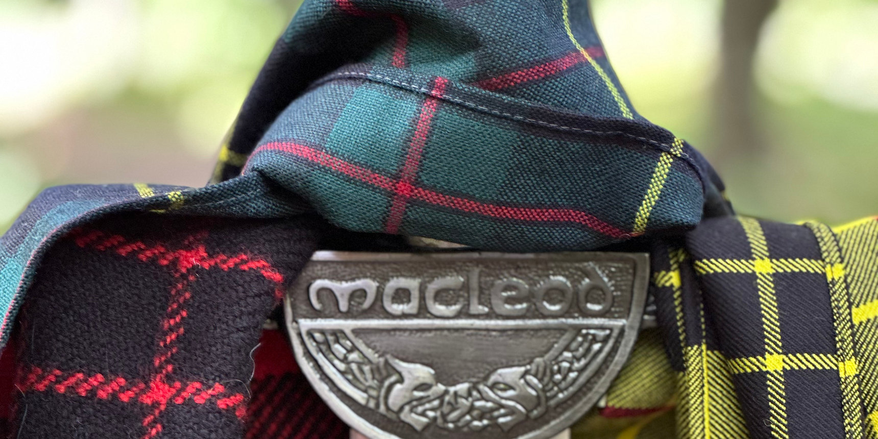 Macleod clan badge on tartan fabric