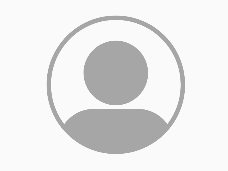Default user profile silhouette on gray background.