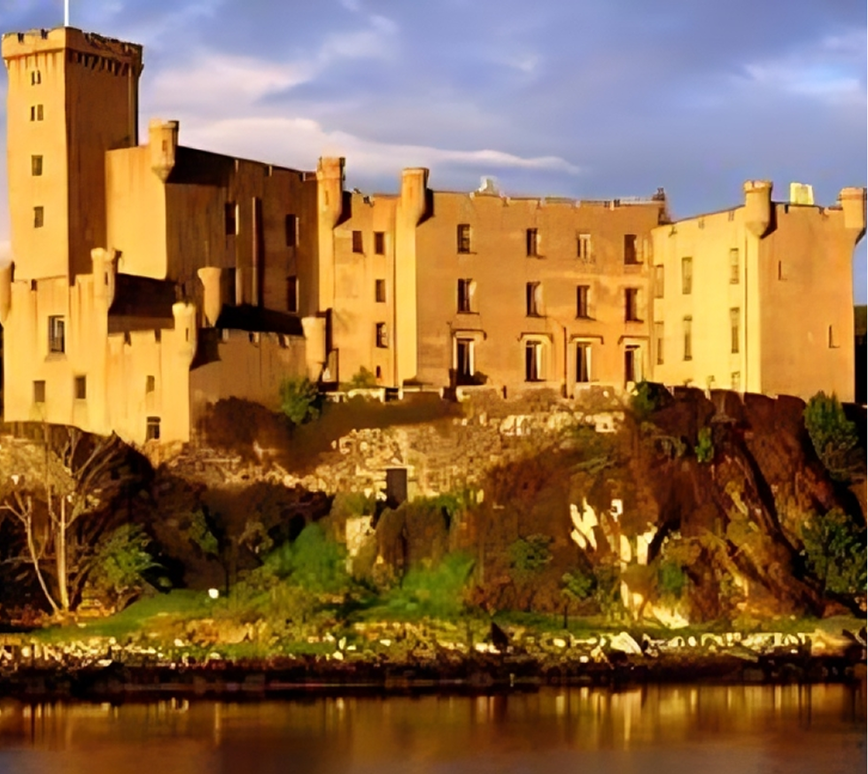 Castle on rocky hill by the water.